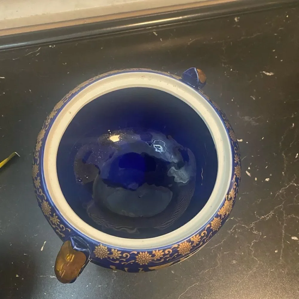 Vintage oriental vase with lid